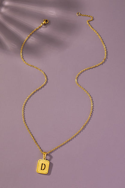 Brass diamond dust cut out initial necklace